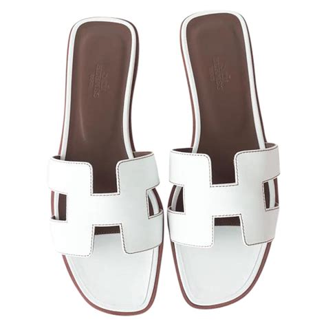 white hermes sandals.